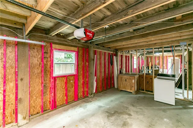 a view of a balcony with wooden floor and fence