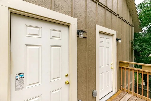 a view of a balcony with wooden floor