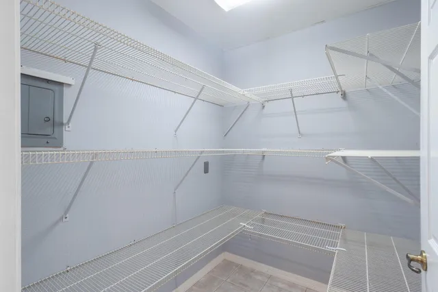 a view of a room with racks on the wall