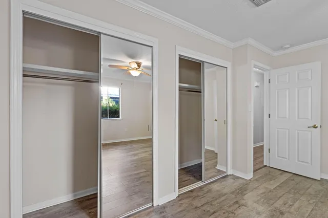 a view of entryway with wooden floor