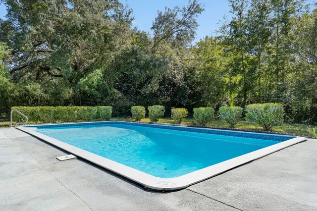 a view of outdoor space and swimming pool