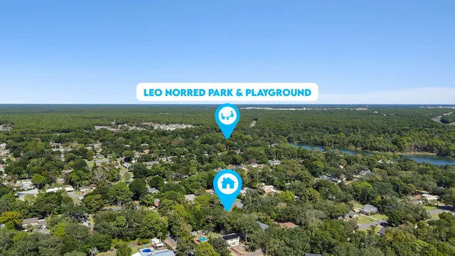 a view of a sign with golf course