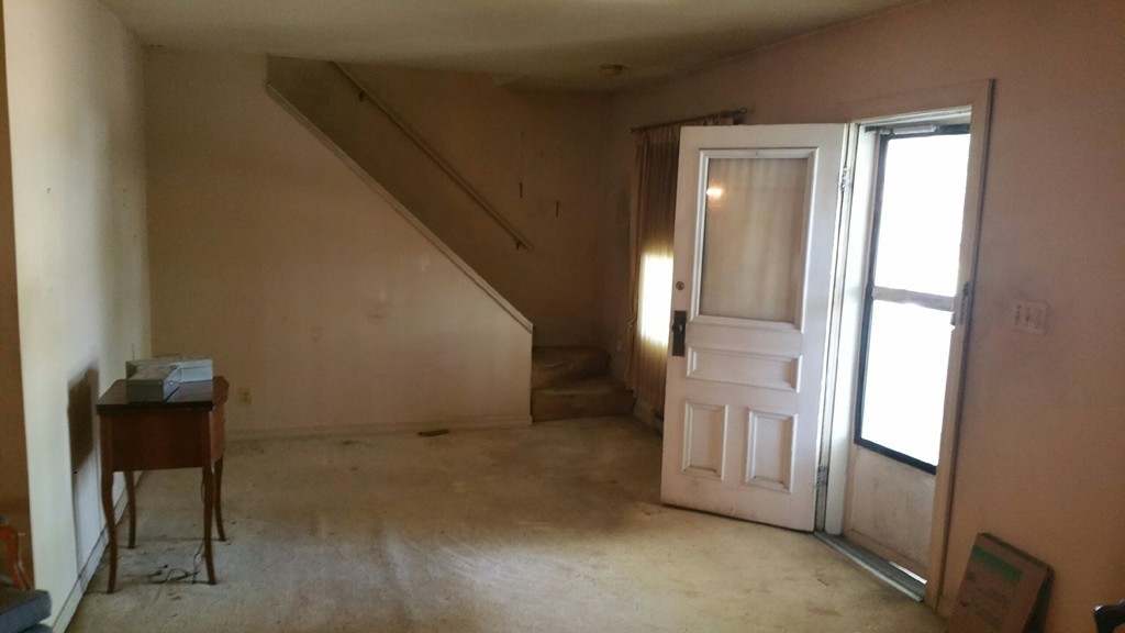 96 Paradise Street Springfield, MA 01129 - Photo 2 of 7 an empty room with windows