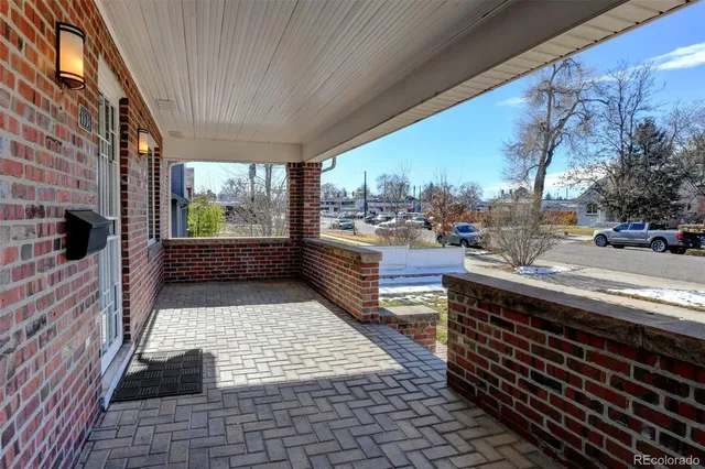 a view of a balcony with furniture