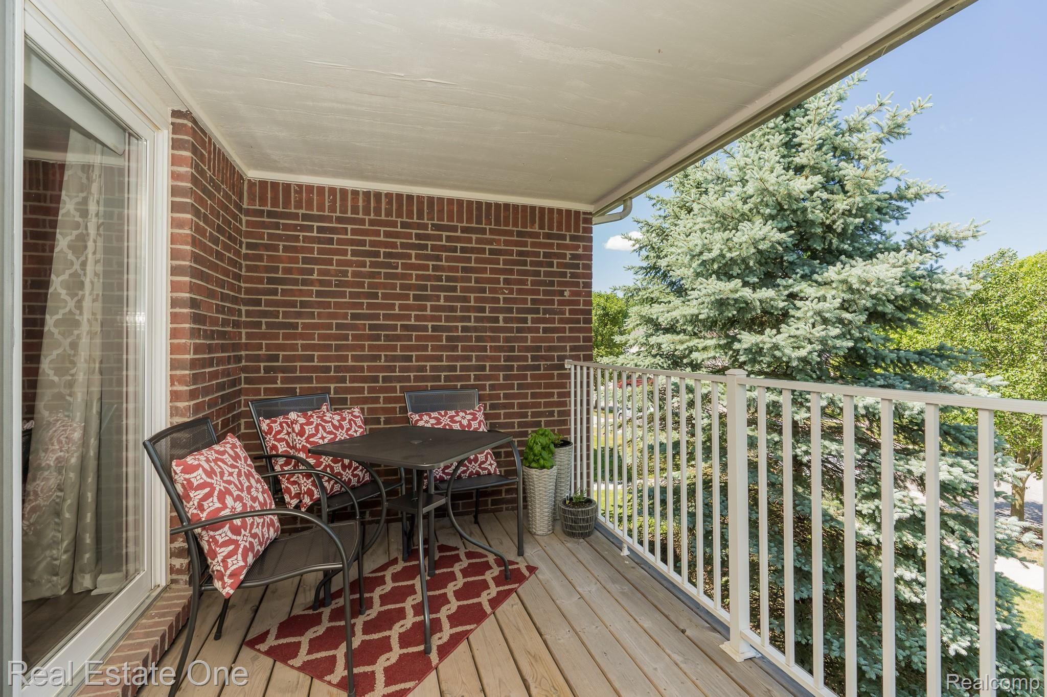 1730 Deepwood Circle, Unit 53 Rochester, MI 48307 - Photo 16 of 25 Balcony from Great Room and Master Bedroom