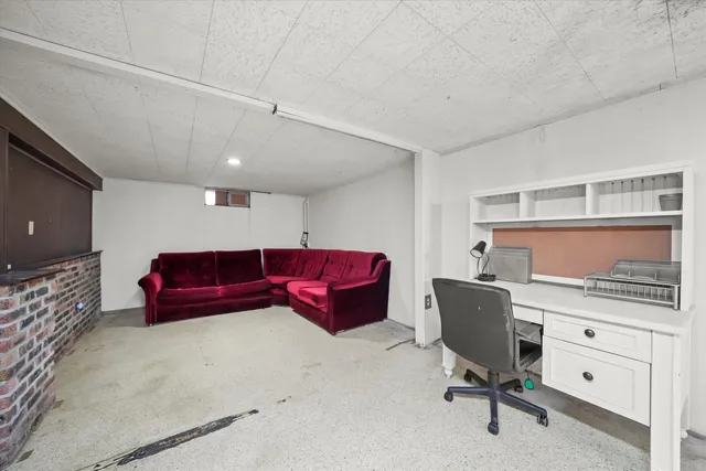 a living room with furniture and a couch