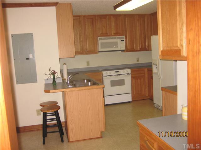 3908 Littlefield Court Raleigh, NC 27606 - Photo 18 of 25 MORE KITCHEN VIEW