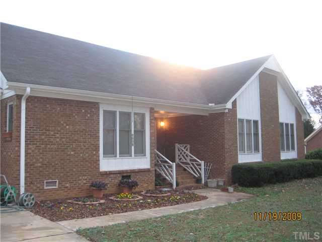 3908 Littlefield Court Raleigh, NC 27606 - Photo 22 of 25 ANOTHER EXTERIOR VIEW OF THE THIS ONE STORY ALL BRICK HOME
