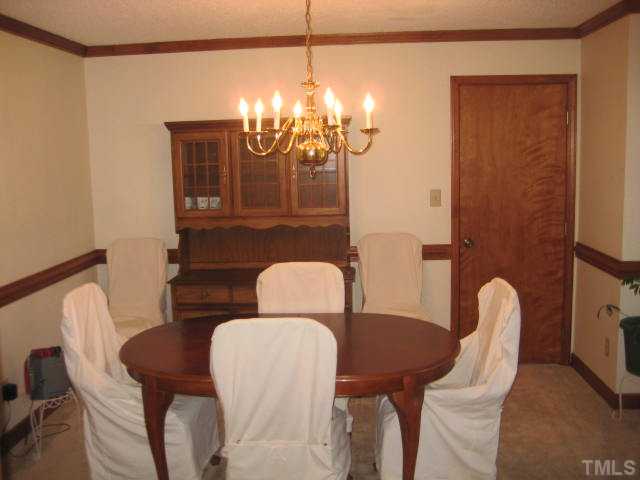 3908 Littlefield Court Raleigh, NC 27606 - Photo 23 of 25 FORMAL DINING ROOM