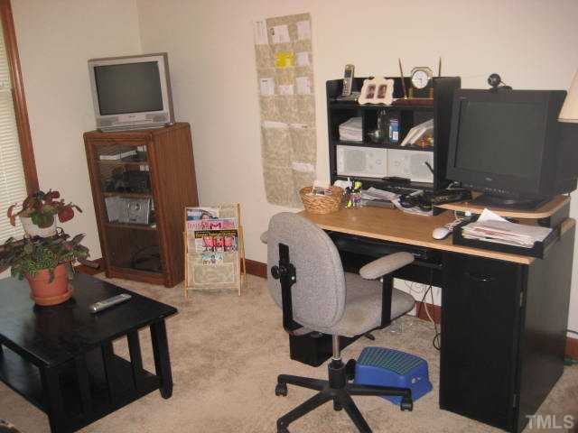 3908 Littlefield Court Raleigh, NC 27606 - Photo 24 of 25 ONE OF THE 3 BEDROOMS BEING USED AS AN OFFICE