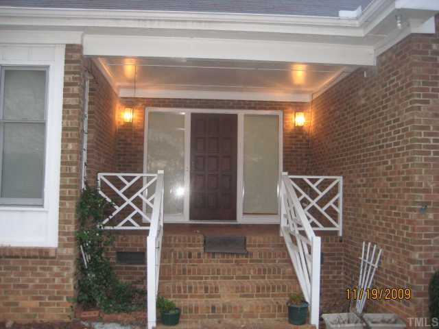 3908 Littlefield Court Raleigh, NC 27606 - Photo 9 of 25 COVERED FRONT PORCH