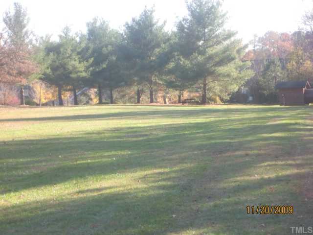 3908 Littlefield Court Raleigh, NC 27606 - Photo 10 of 25 BACKYARD VIEW OF LARGE FLAT LOT