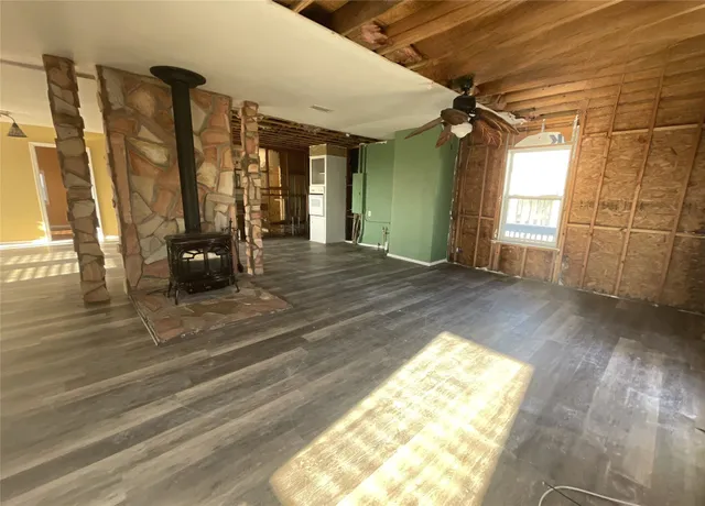 a view of an empty room and window