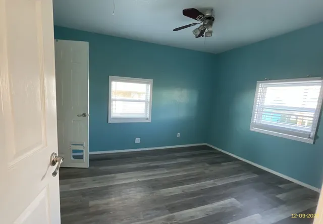 an empty room with windows