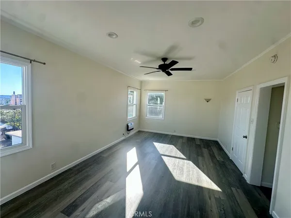 an empty room with windows