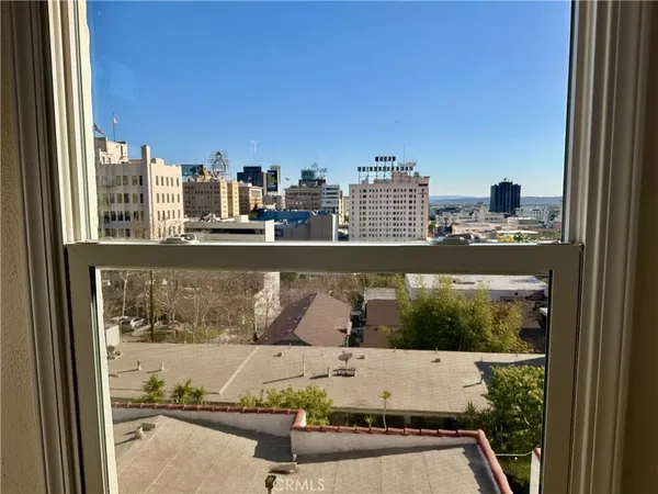 a view of swimming pool from a balcony