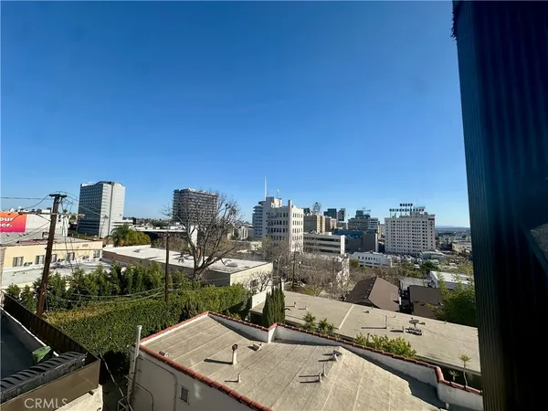a view of a terrace with chairs