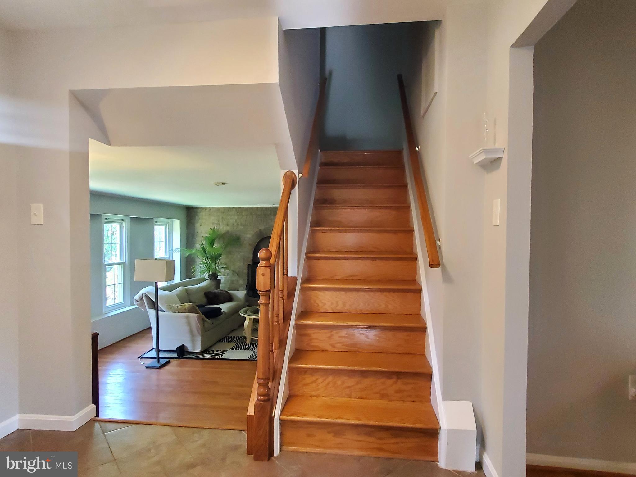 1516 Winding Waye Lane Silver Spring, MD 20902 - Photo 19 of 55 a view of entryway and hall with wooden floor