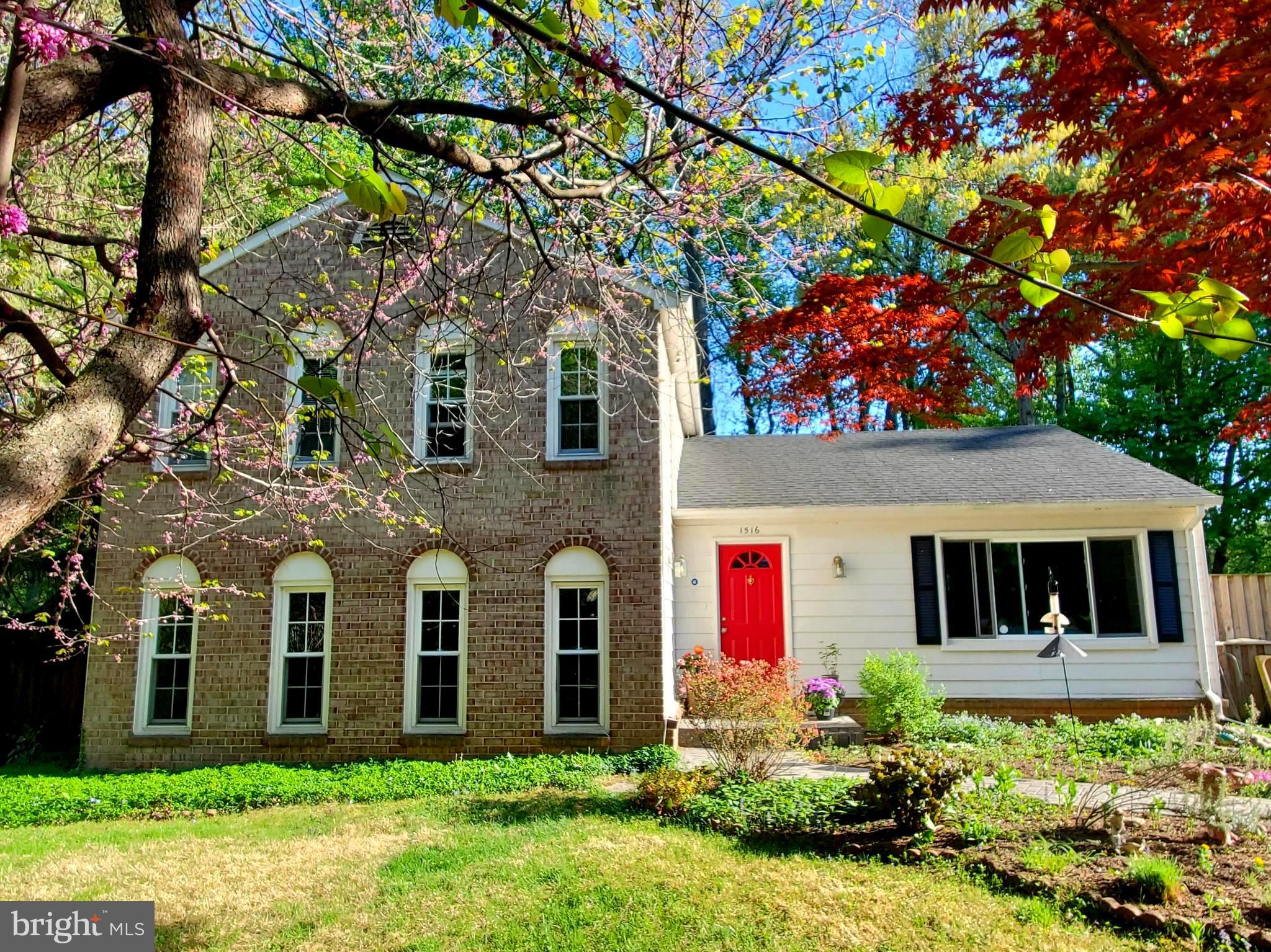 1516 Winding Waye Lane Silver Spring, MD 20902 - Photo 3 of 55 front view of a house with a yard