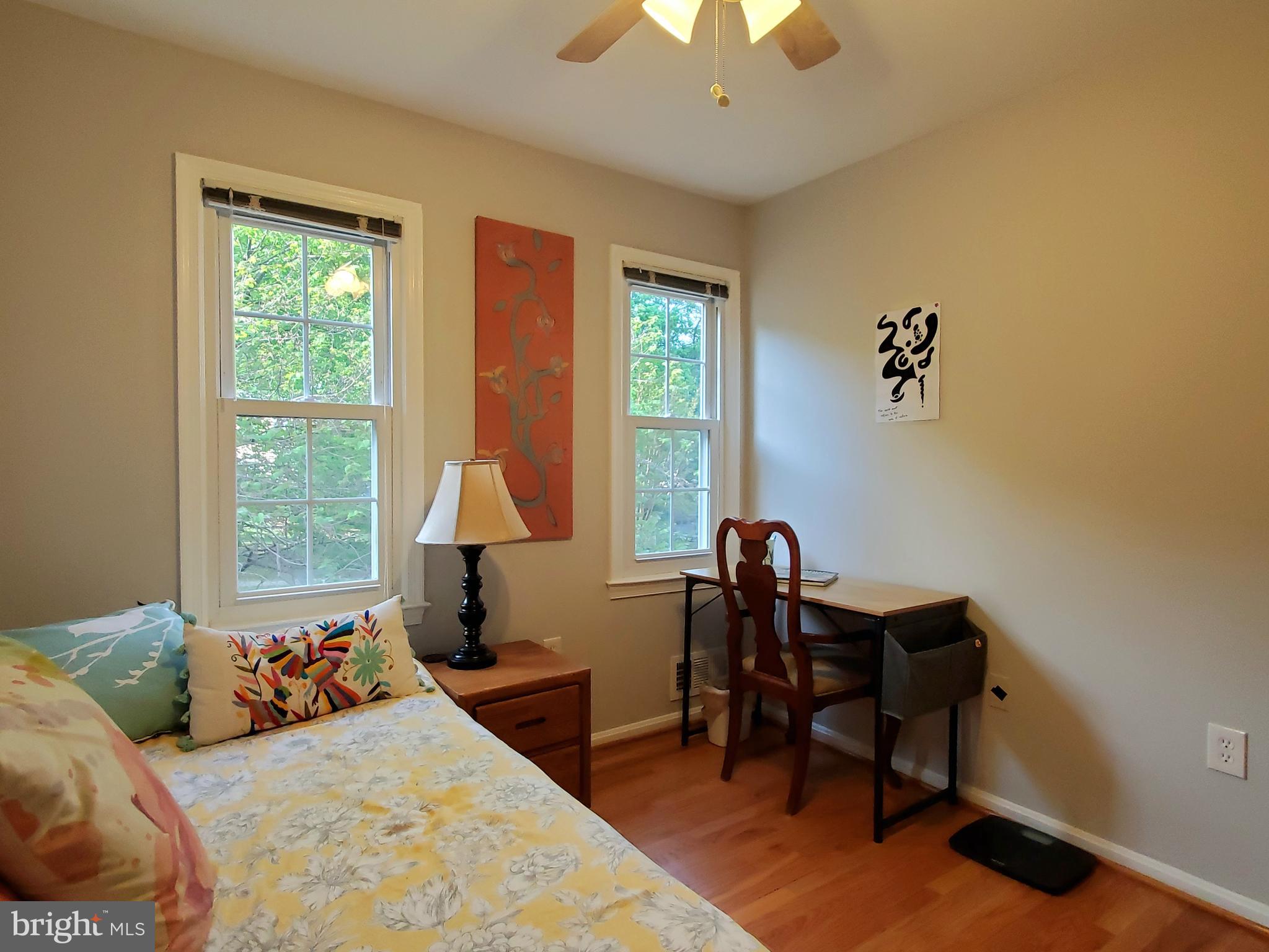 1516 Winding Waye Lane Silver Spring, MD 20902 - Photo 34 of 55 a bedroom with a bed and a chandelier