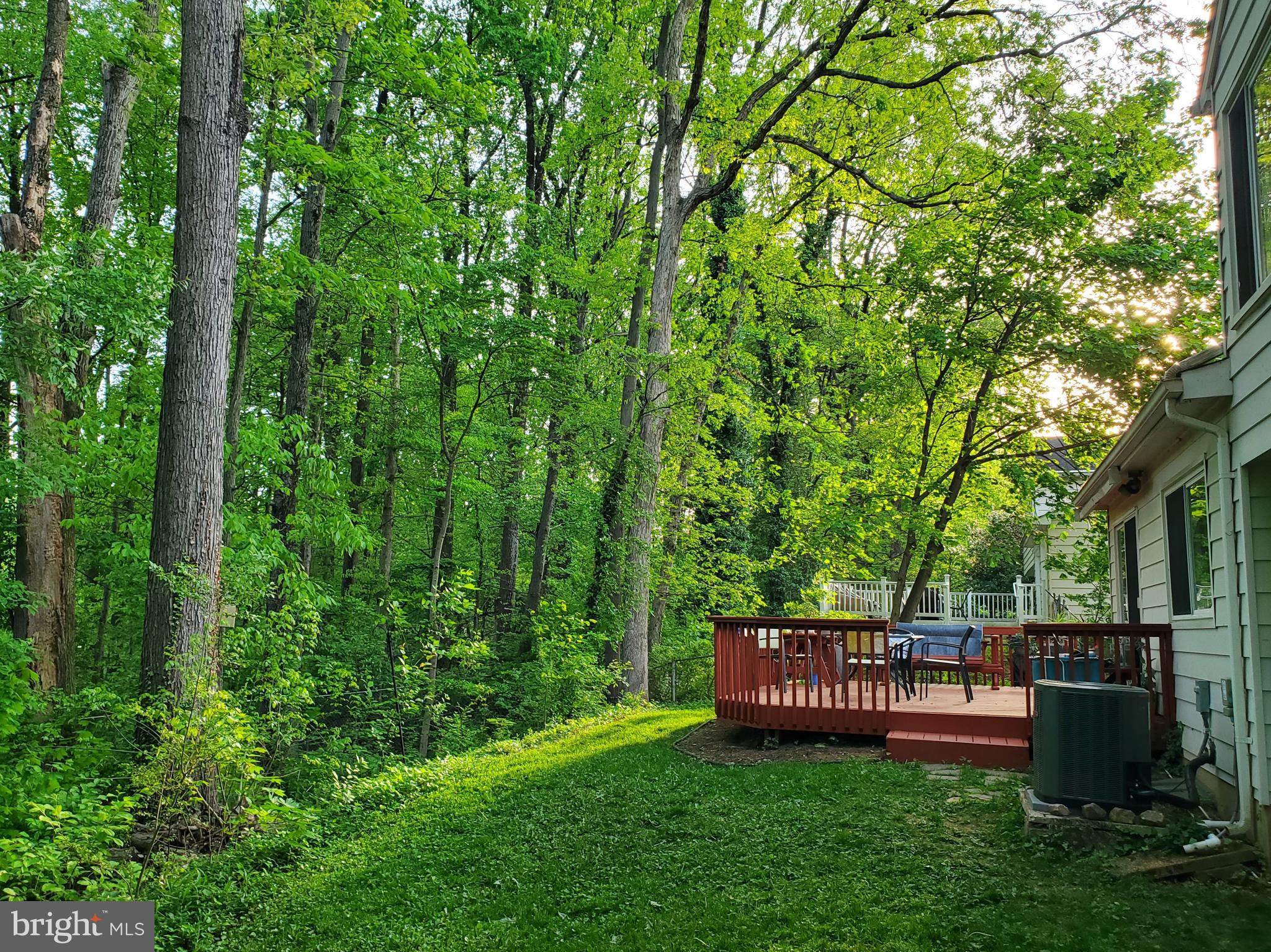 1516 Winding Waye Lane Silver Spring, MD 20902 - Photo 48 of 55 a view of a deck with a wooden fence