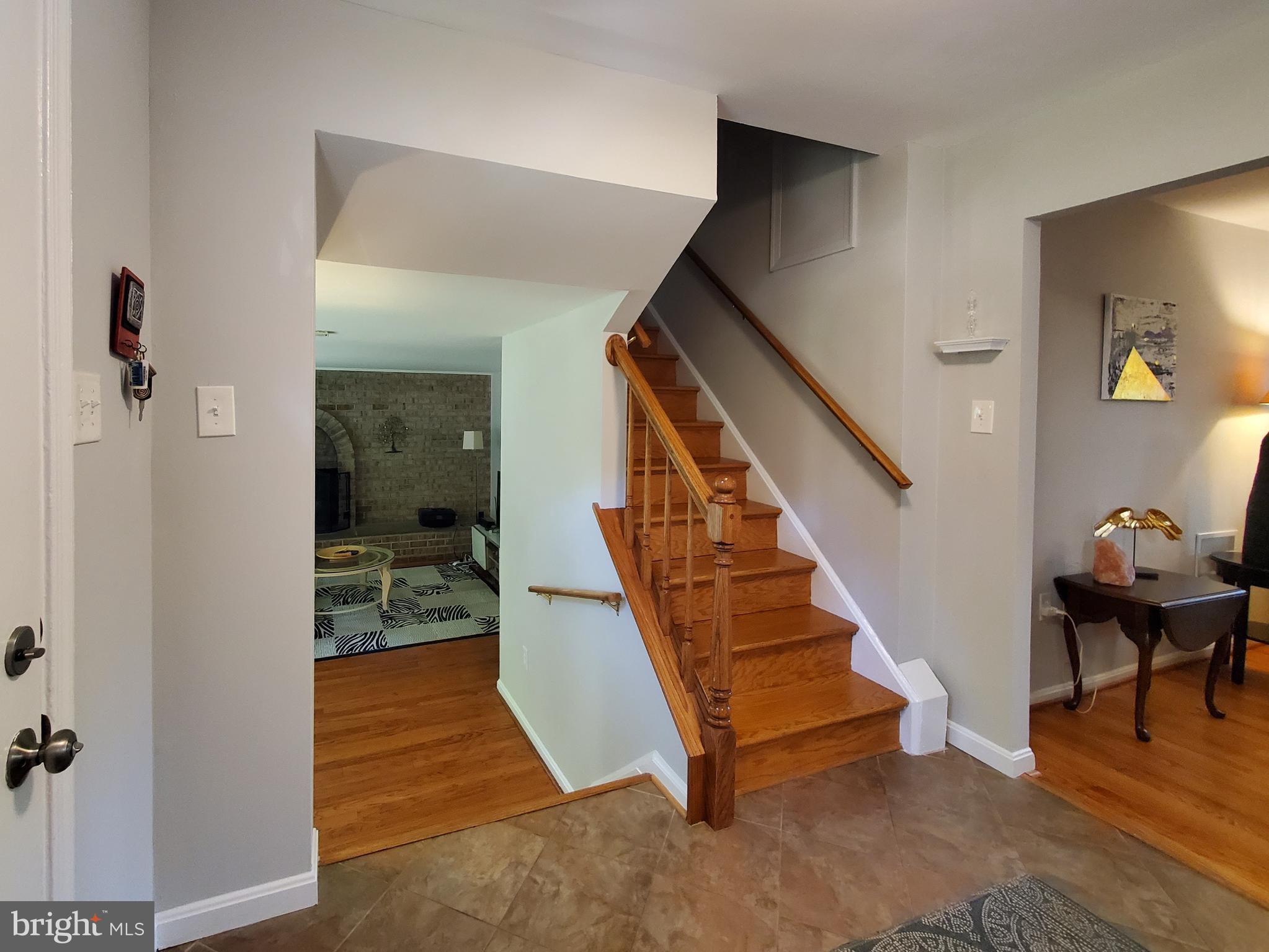 1516 Winding Waye Lane Silver Spring, MD 20902 - Photo 6 of 55 a view of entryway and hall with a bath tub