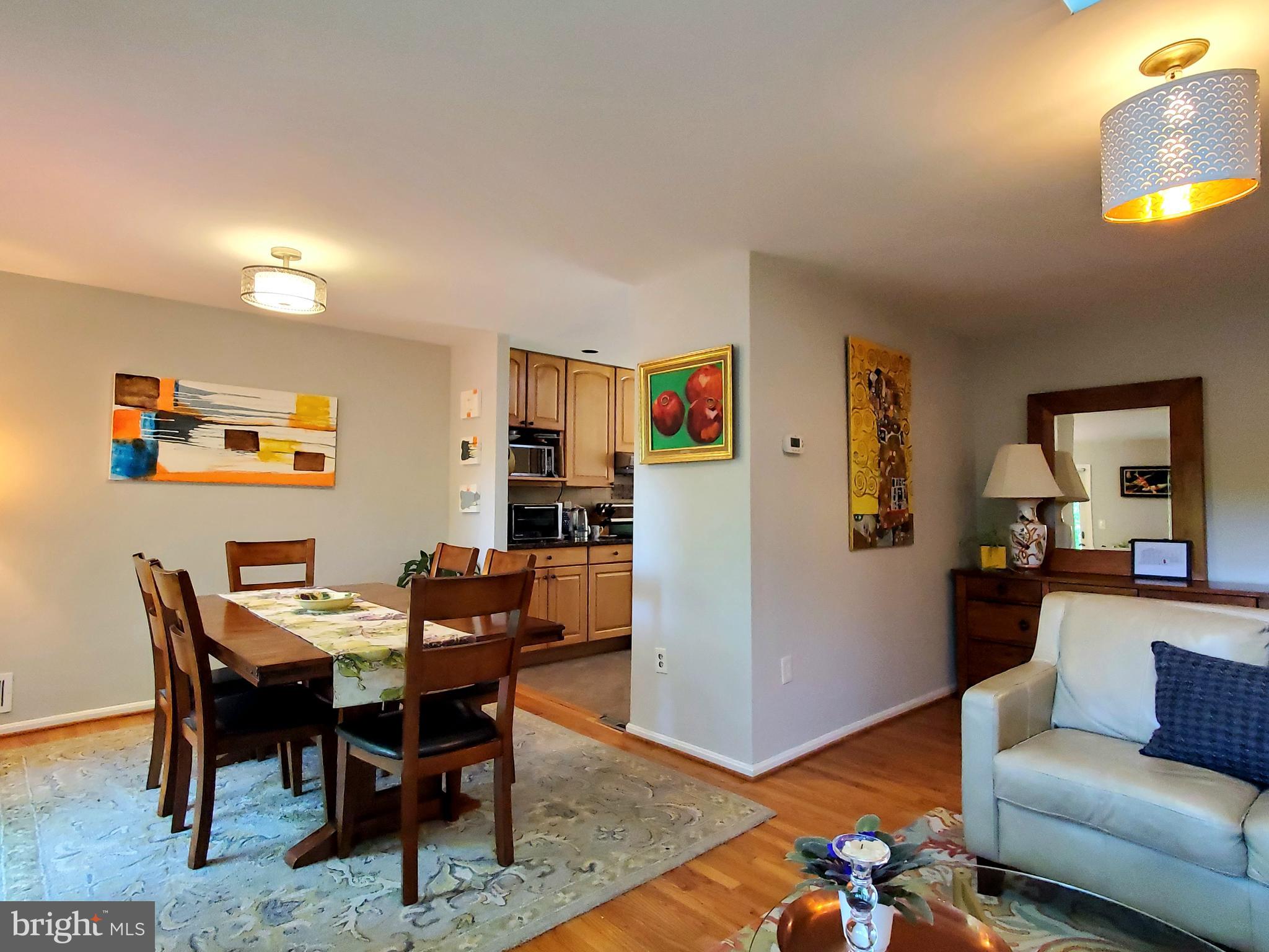 1516 Winding Waye Lane Silver Spring, MD 20902 - Photo 8 of 55 a view of a livingroom with furniture and wooden floor