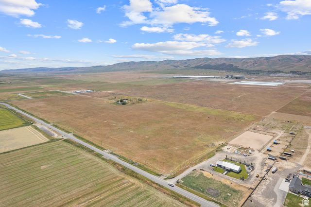 1122 Goshen Canyon Road Mona, UT 84645 - Photo 2 of 6 Aerial view of sparsely populated area featuring mountains and extensive farmland