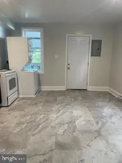 a view of room with window and hardwood floor
