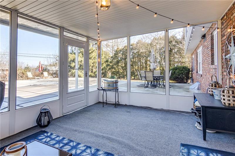 1609 Terrie Drive Pittsburgh, PA 15241 - Photo 20 of 24 Enjoy relaxing in the screened in porch which overlooks the swimming pool.
