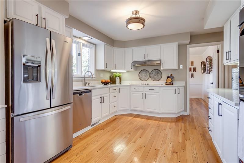 1609 Terrie Drive Pittsburgh, PA 15241 - Photo 5 of 24 Electric cooktop and quartz countertop.