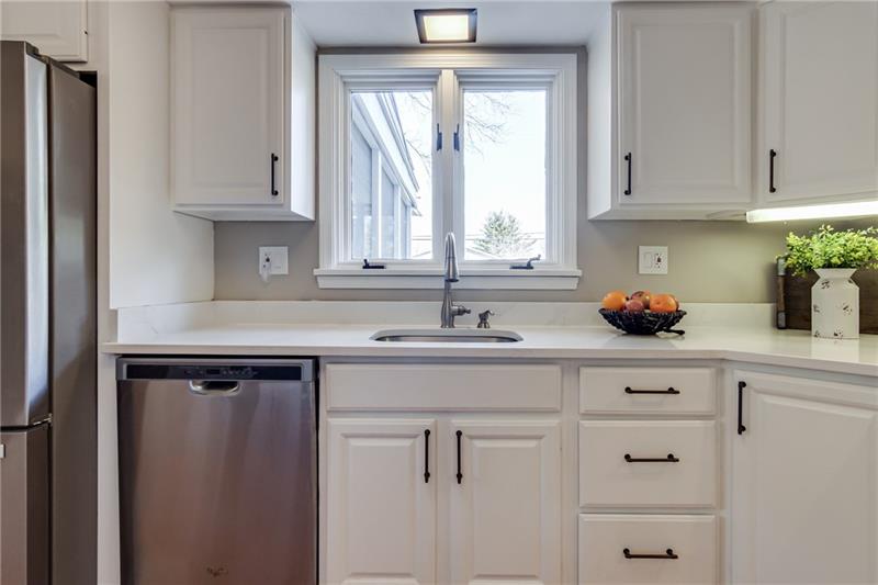 1609 Terrie Drive Pittsburgh, PA 15241 - Photo 6 of 24 Enjoy doing dishes while overlooking the backyard swimming pool.