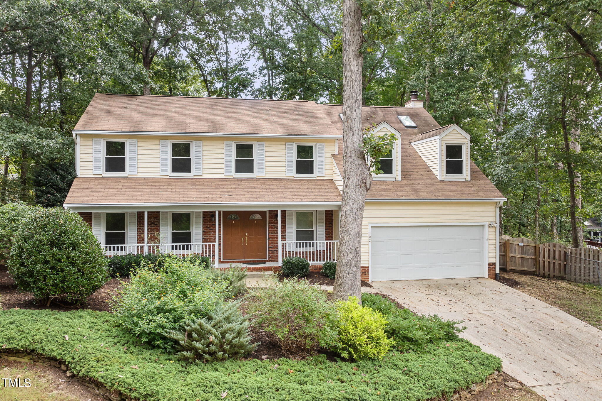 102 Old Bellows Court Raleigh, NC 27607 - Photo 1 of 36 front view of a house with a yard