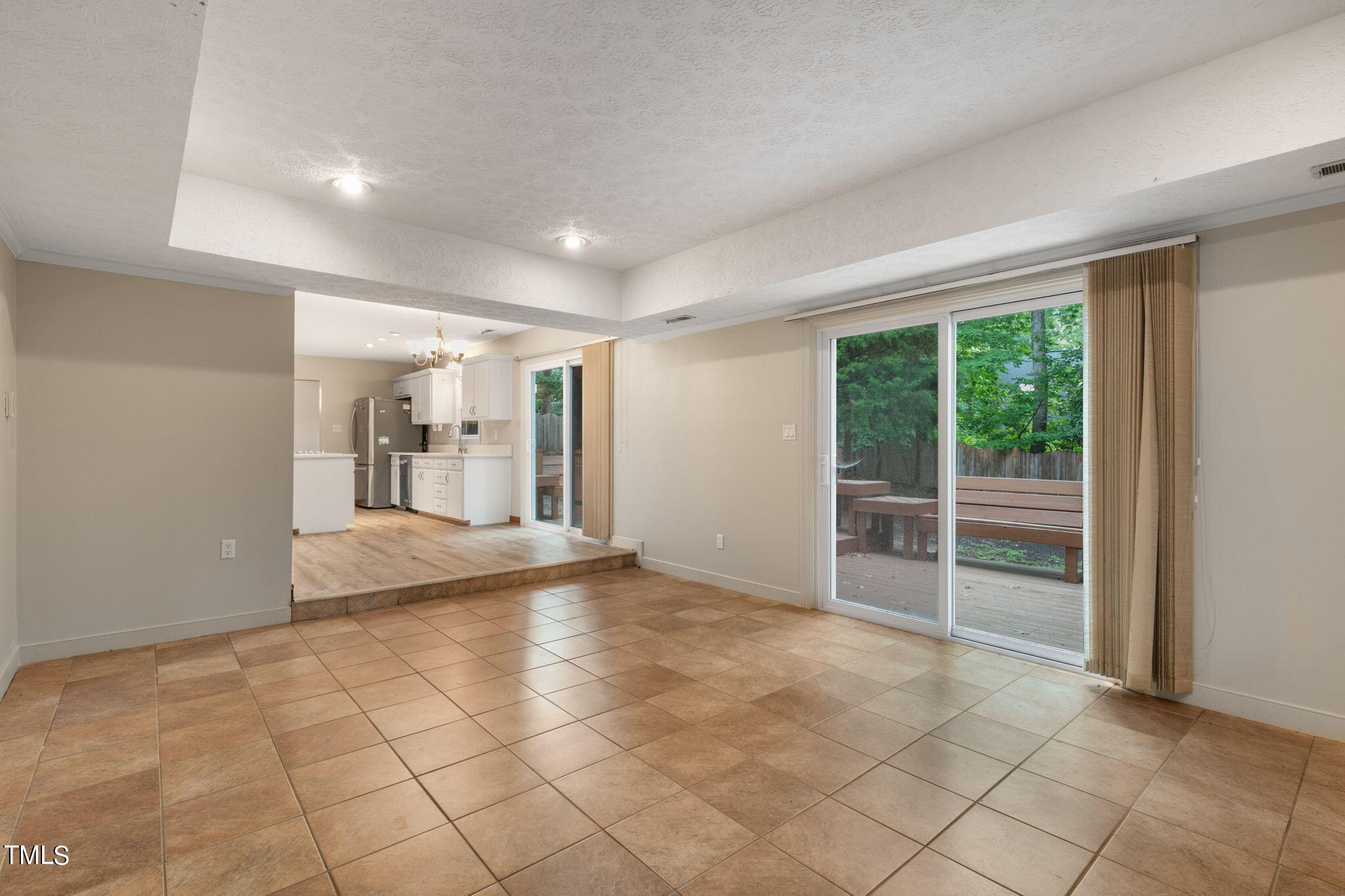 102 Old Bellows Court Raleigh, NC 27607 - Photo 17 of 36 a view of an empty room with a window