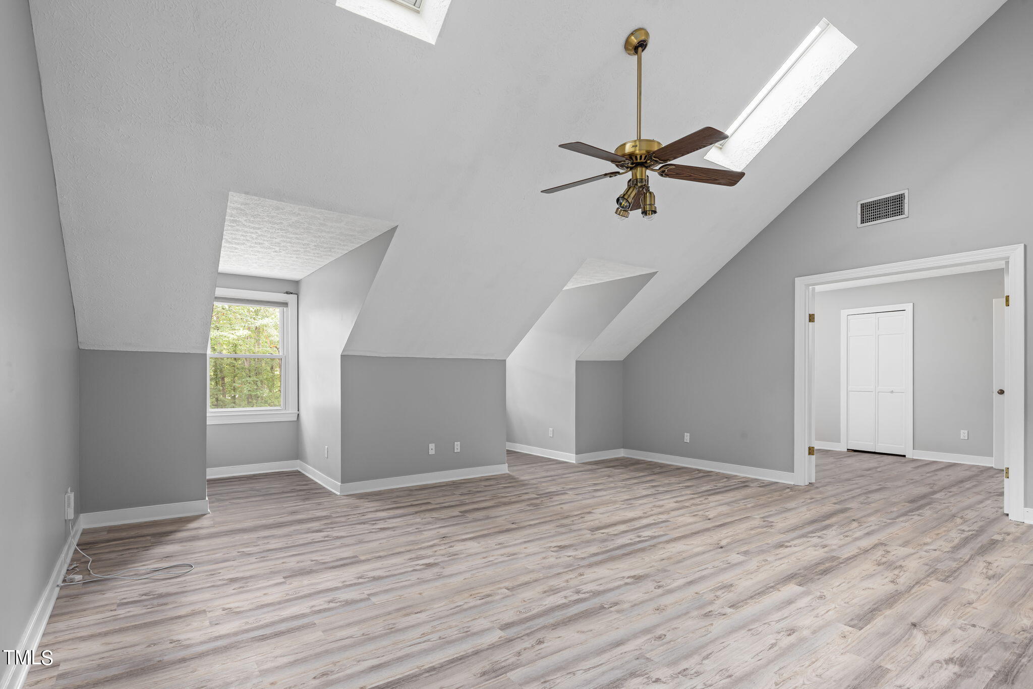 102 Old Bellows Court Raleigh, NC 27607 - Photo 23 of 36 a view of an empty room with a window