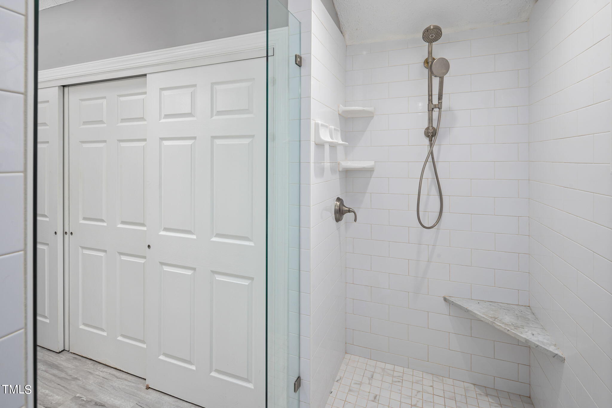 102 Old Bellows Court Raleigh, NC 27607 - Photo 26 of 36 a bathroom with a shower