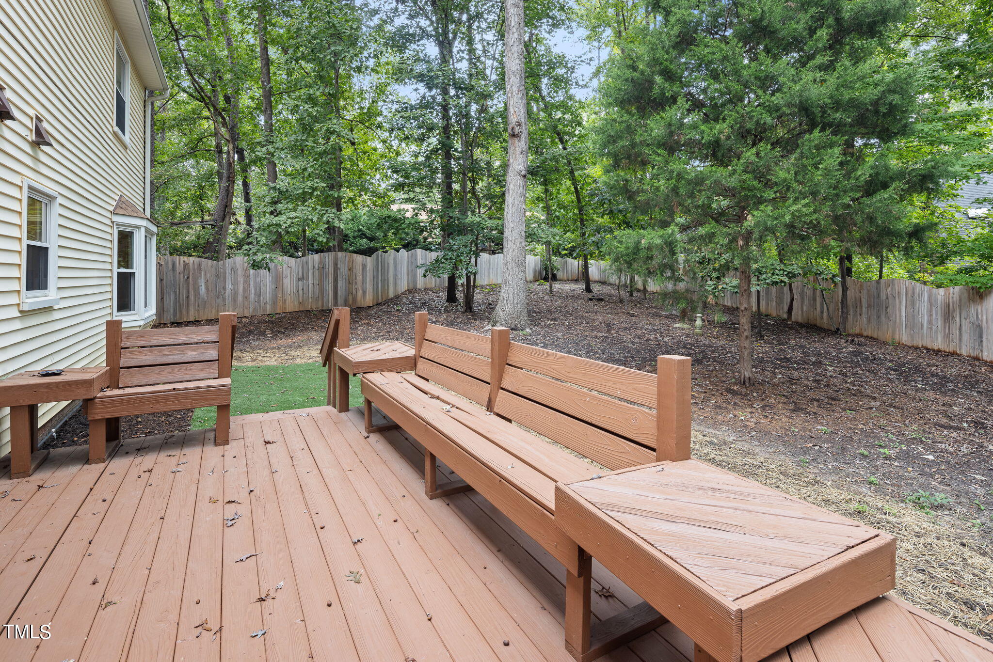 102 Old Bellows Court Raleigh, NC 27607 - Photo 32 of 36 a view of a backyard with sitting area