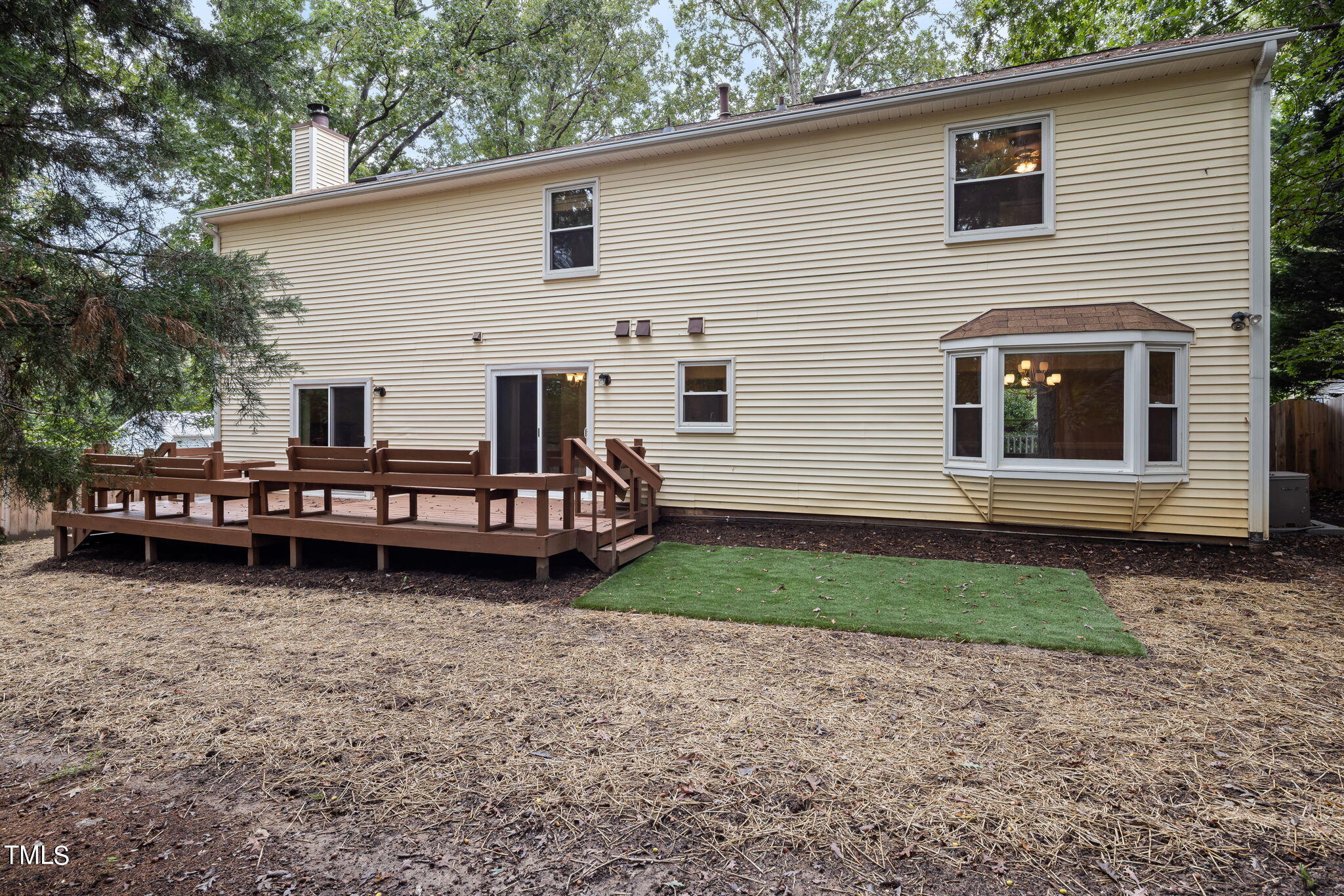102 Old Bellows Court Raleigh, NC 27607 - Photo 33 of 36 a view of a house in back yard