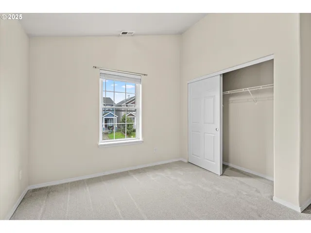a bathroom with a sink double vanity and a mirror