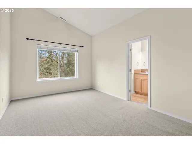 a bathroom with a sink double vanity and a mirror
