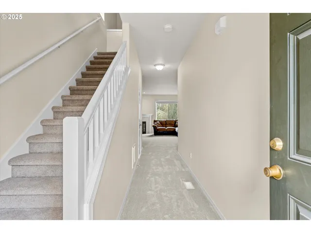 a view of an entryway with staircase