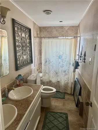 $610,000 | 141 West Park Manor Drive, Moss Bluff, LA 70611