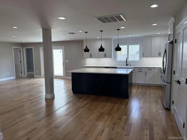 a very nice looking room with a dining table chairs