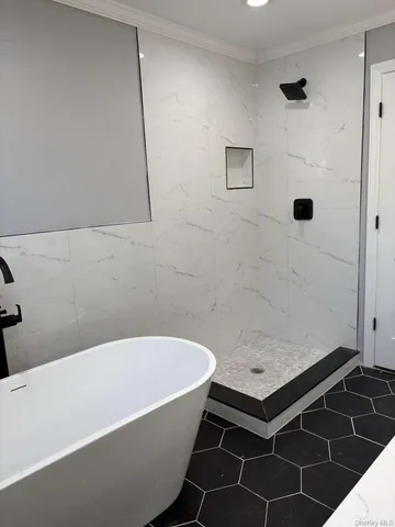 a bathroom with a sink toilet and a mirror