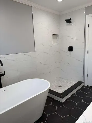 a bathroom with a sink toilet and a mirror