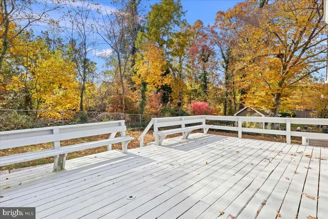 a view of a balcony with chairs