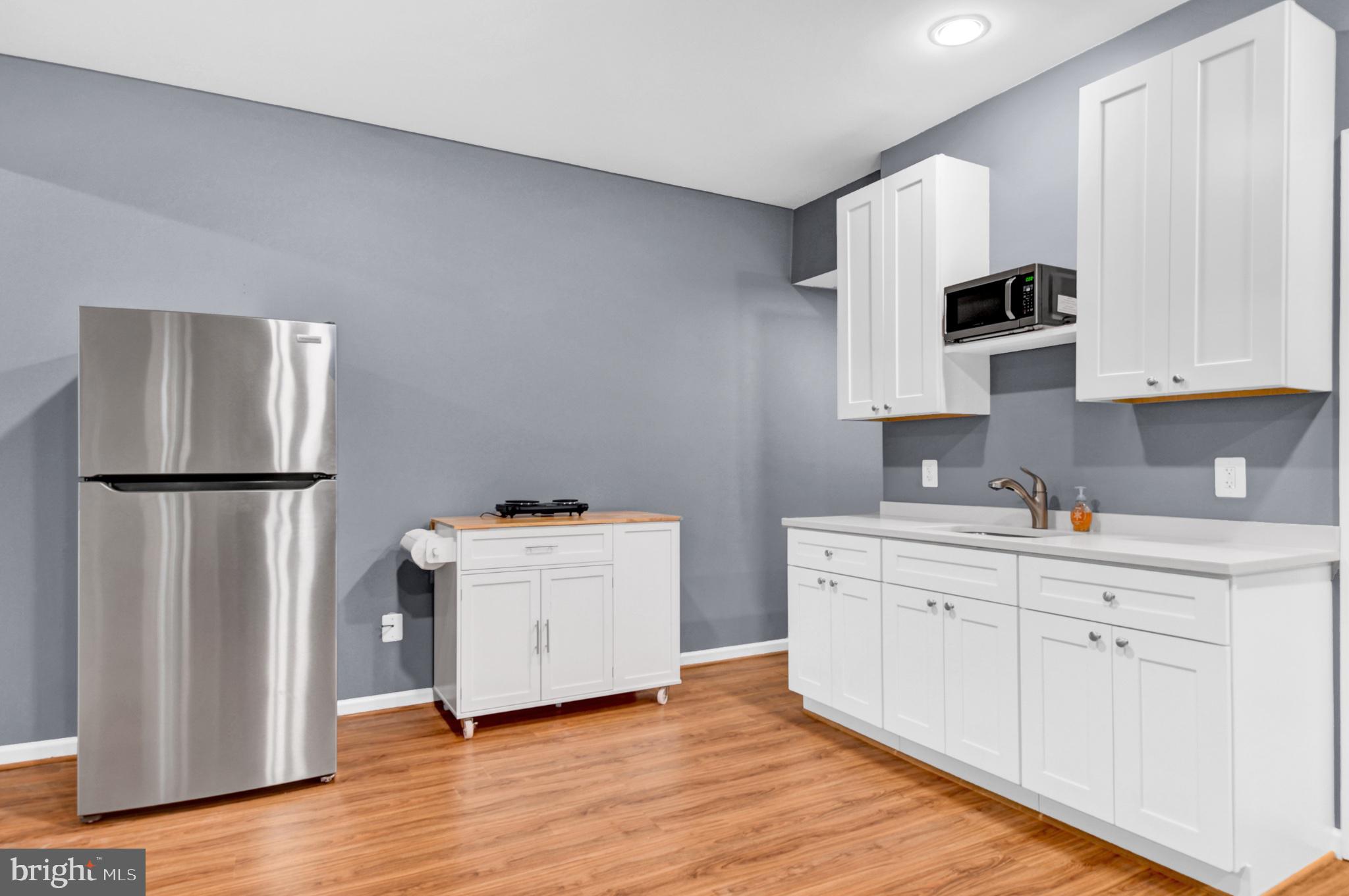 205 Grassy Ridge Terrace Purcellville, VA 20132 - Photo 5 of 12 Modern kitchen with sleek finishes.