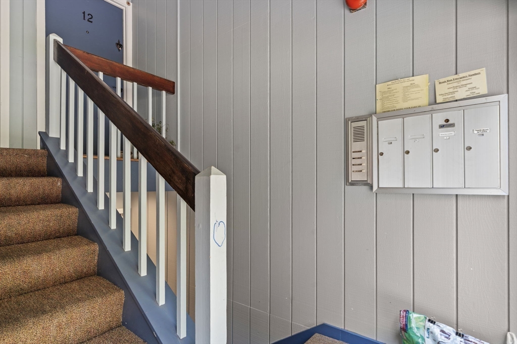 374 Great Road, Unit 11 Acton, MA 01720 - Photo 30 of 30 a view of staircase with wooden floor