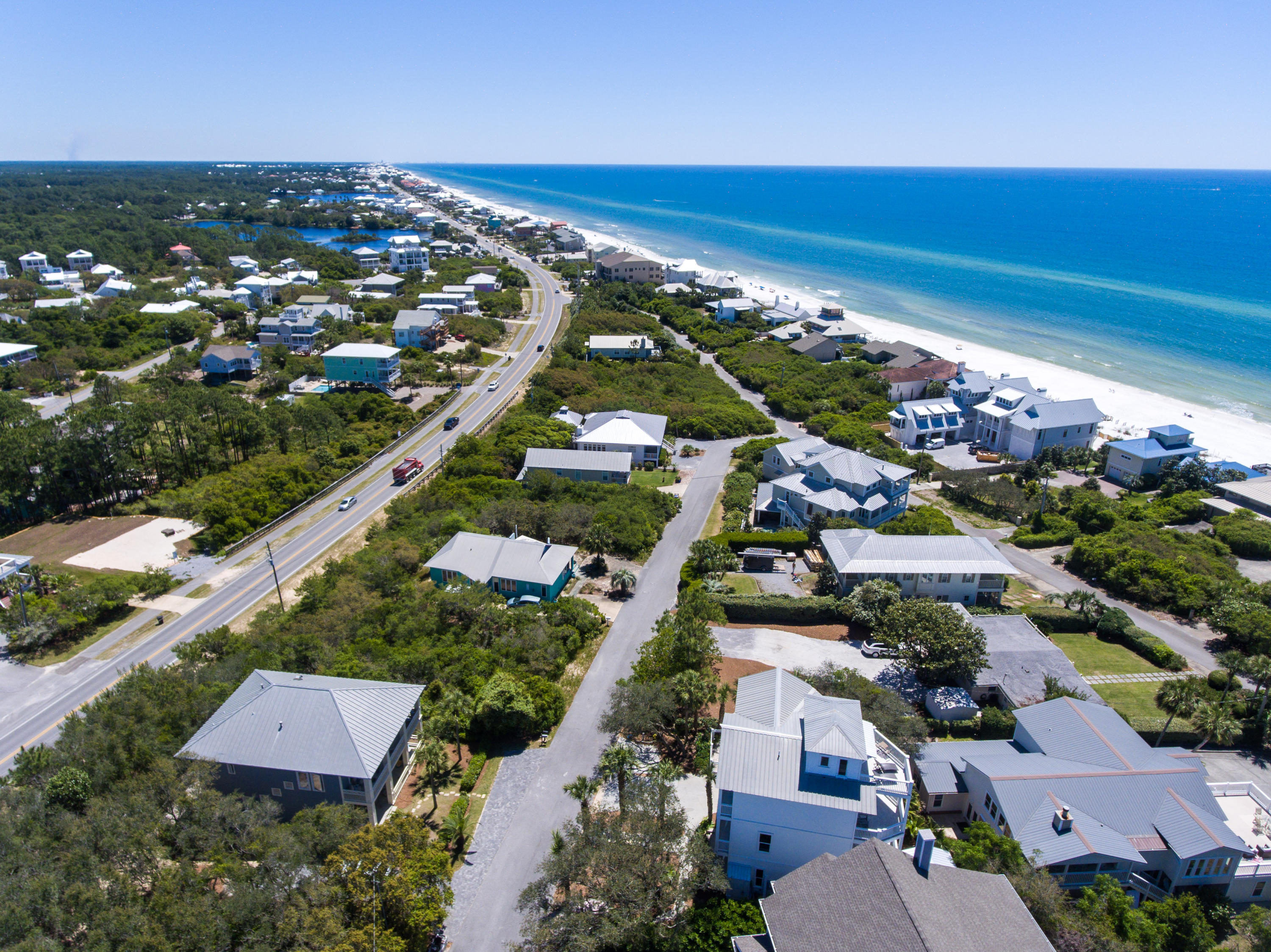 Lot 6 Bullard Road Santa Rosa Beach, FL 32459 - Photo 9 of 12 an aerial view of a city with lots of residential buildings
