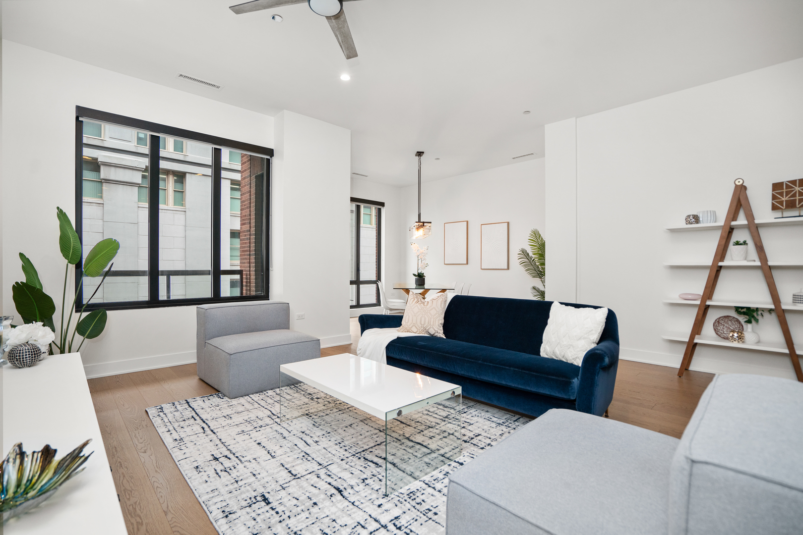 313 South Racine Avenue, Unit 4B Chicago, IL 60607 - Photo 11 of 33 a living room with furniture and wooden floor